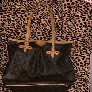 Louis Vuitton purse/carry on